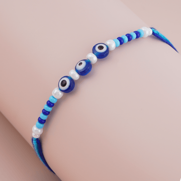 Three Evil Eye Beaded Rakhi by Shree Rakhi